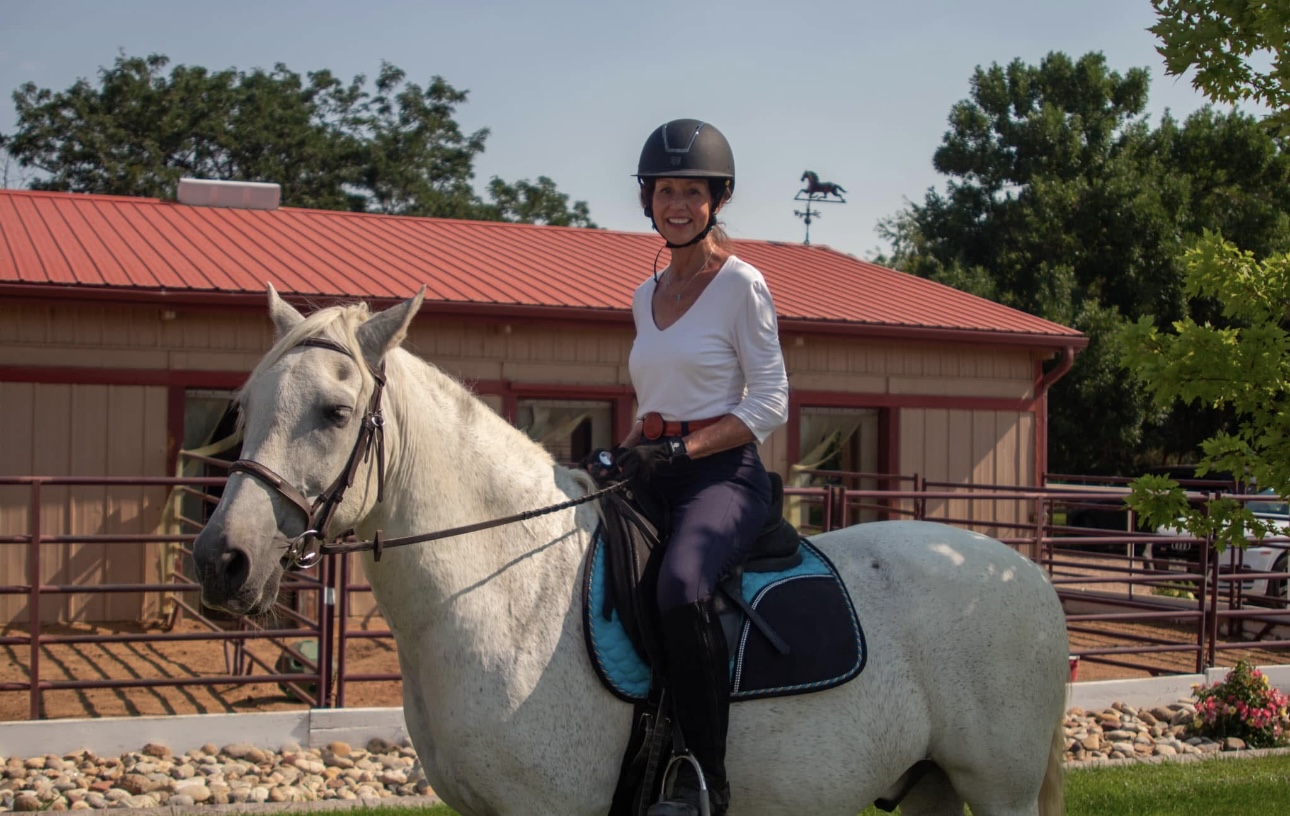 Women indoor horse riding